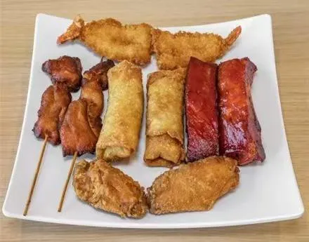 Assorted appetizer platter with fried shrimp, egg rolls and ribs at Zheng's Chinese Kitchen，a Chinese Restaurant in Goodyear
